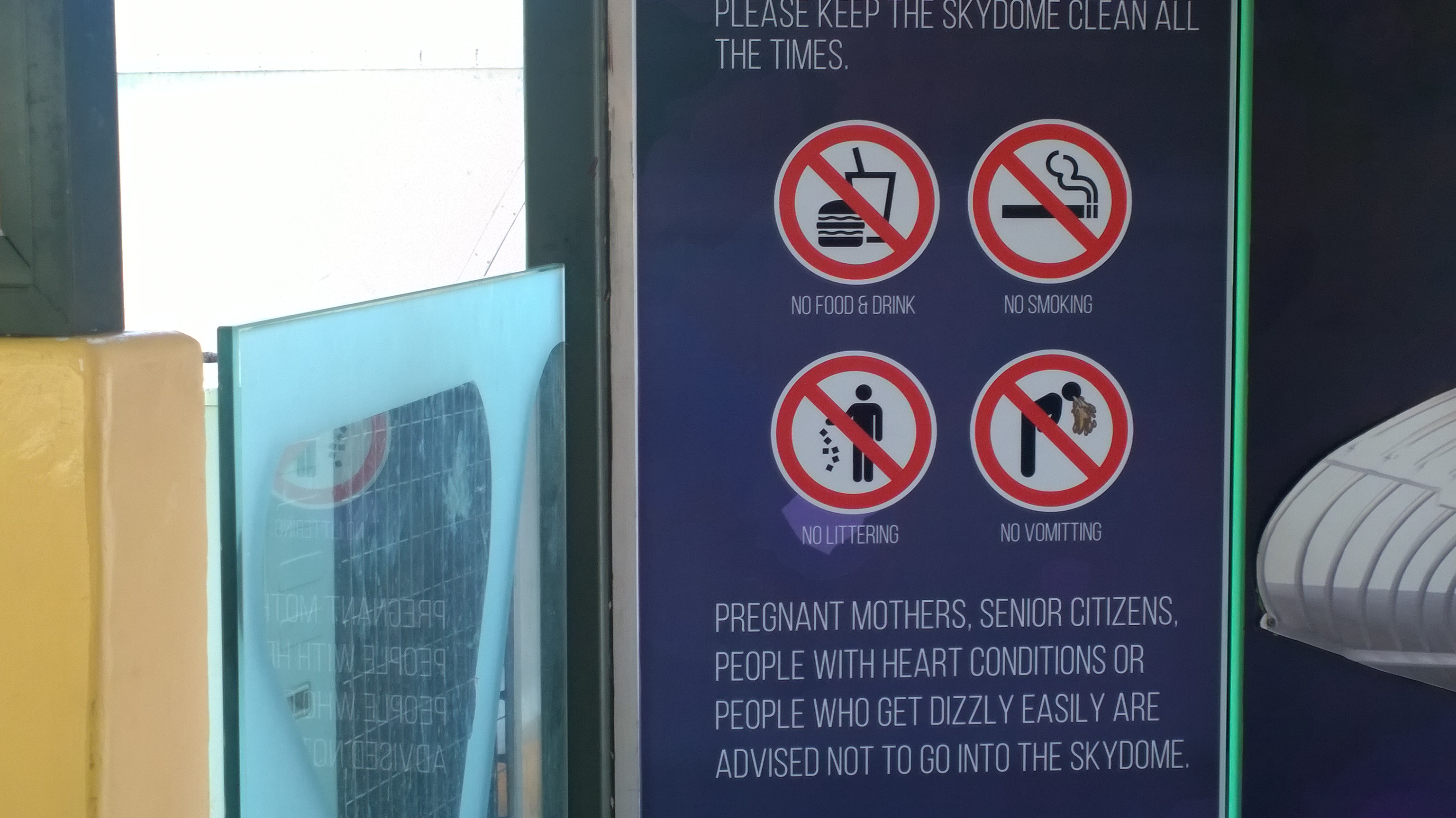 Sign at the Skydome in Langkawi, Malaysia that says No vomiting